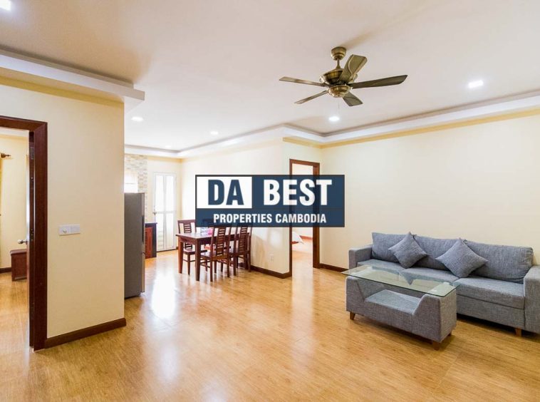 Generous 2 bedroom serviced apartment for rent in Siem Reap Angkor view of living area with ceiling fan and dining table and sofa