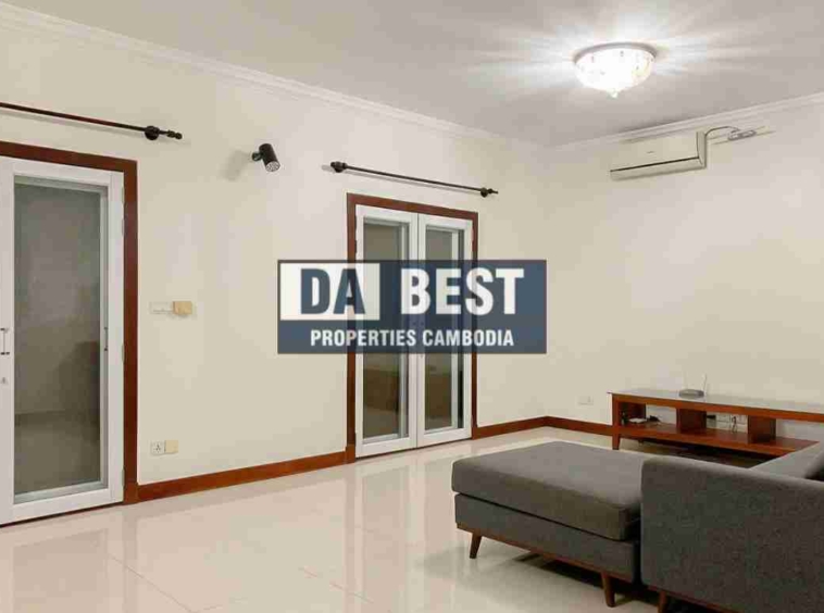 4 bedroom family villa for long term rent with shared swimming pool in siem reap dining table and sofa