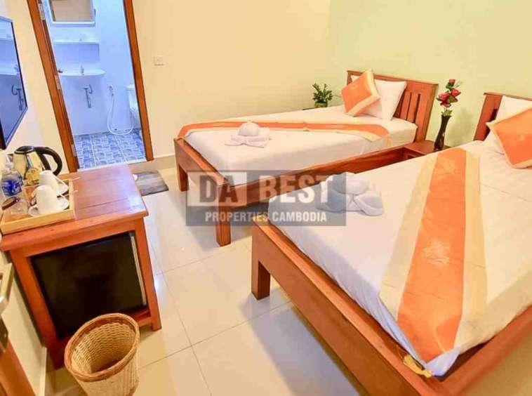 Hotel 42 room for sale in siem reap-svay dangkum-bedroom bedroom twin bed with ensuite bathroom